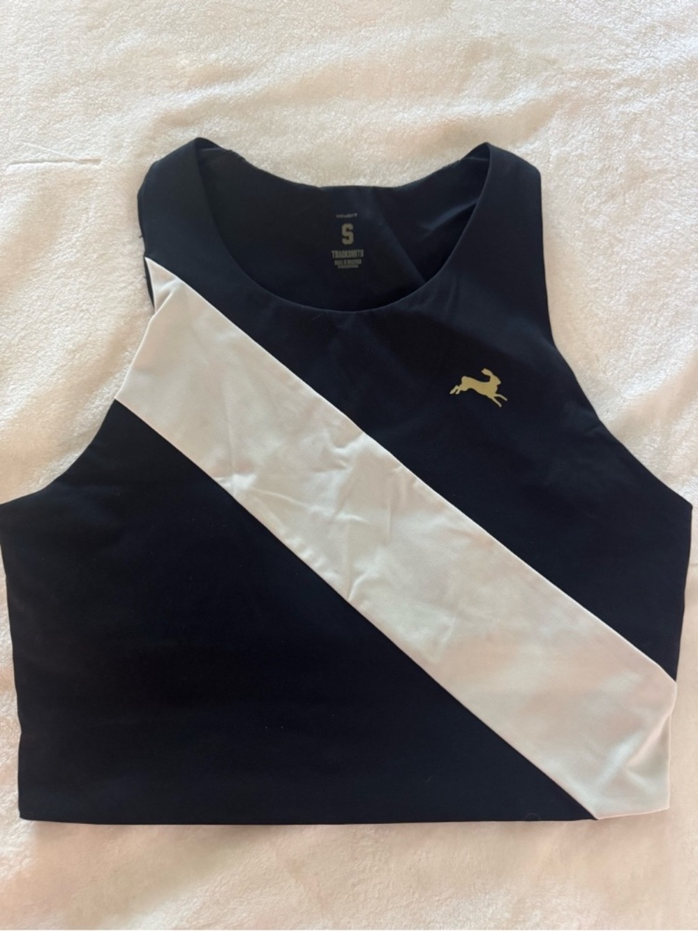 Tracksmith Black Crop Top with White Diagonal Stripe and Gold Hare